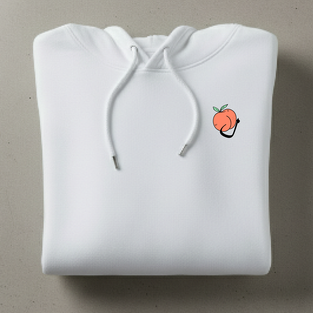 White hoodie with a small peach graphic on a gray background