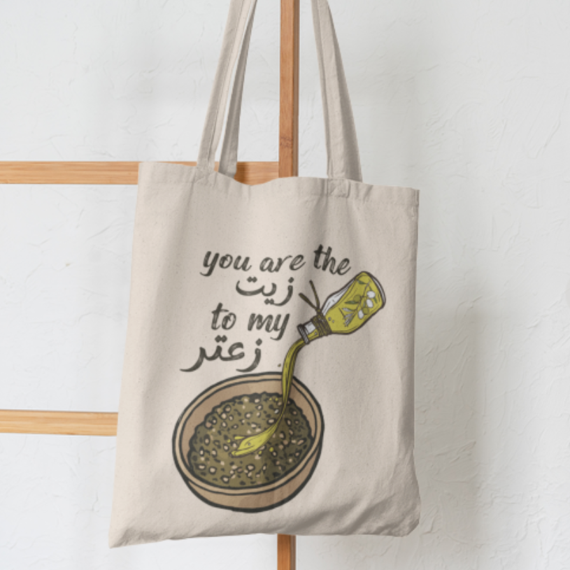 Tote bag with a design and text on a white background